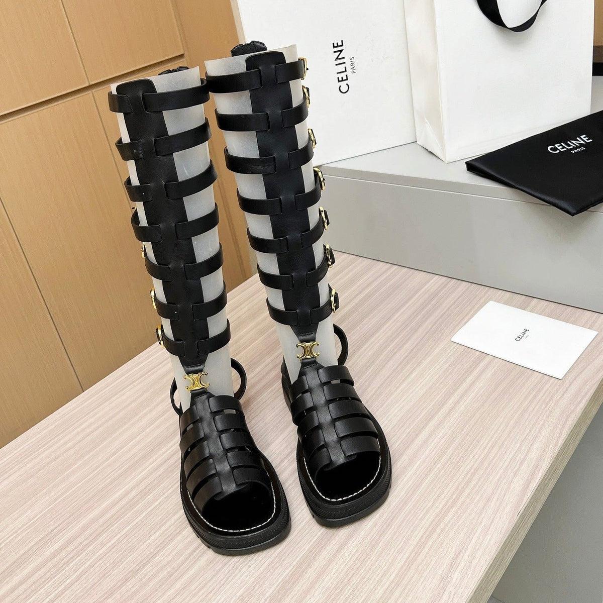 Triomphe high boots leather buckles Black