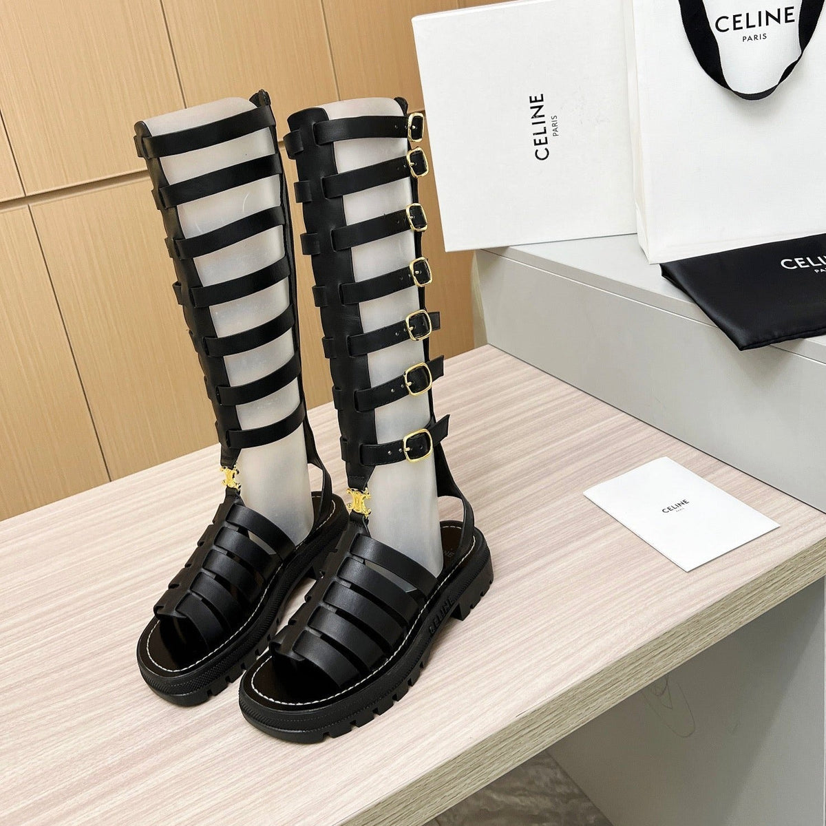 Triomphe high boots leather buckles Black
