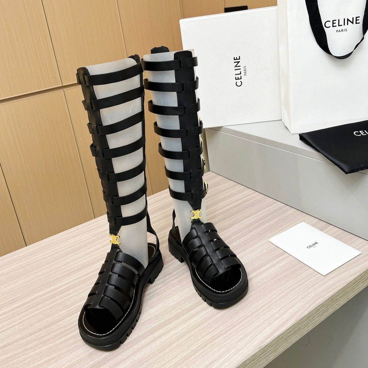 Triomphe high boots leather buckles Black
