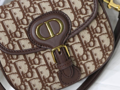 MEDIUM CD BOBBY 22CM CHOCOLATE OBLIQUE CANVAS GOLD HARDWARE