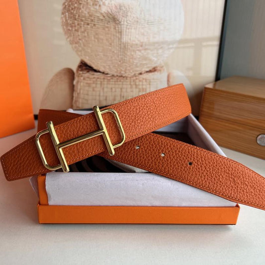 HERMES ROYAL BELT BUCKLE & REVERSIBLE NOIR AND ORANGE LEATHER STRAP 32 MM GOLD HARDWARE