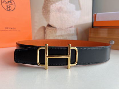 HERMES ROYAL BELT BUCKLE & REVERSIBLE NOIR AND ORANGE LEATHER STRAP 32 MM GOLD HARDWARE