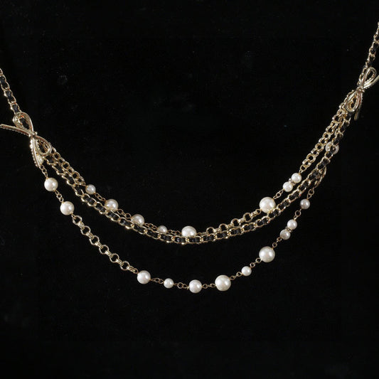 CHANEL 25S GOLD CHAIN BELT WITH PEARL 610440