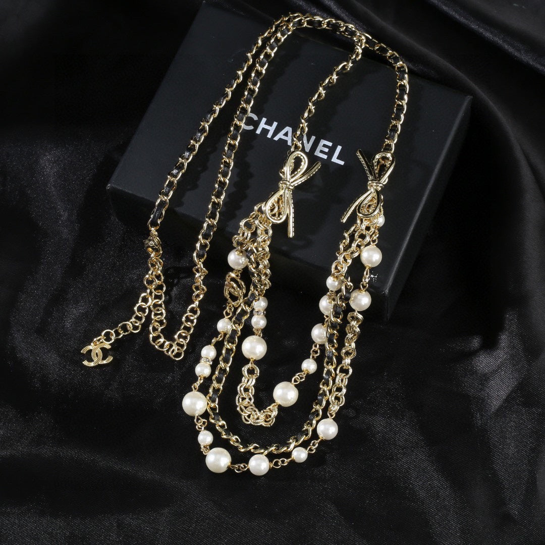 CHANEL 25S GOLD CHAIN BELT WITH PEARL 610440