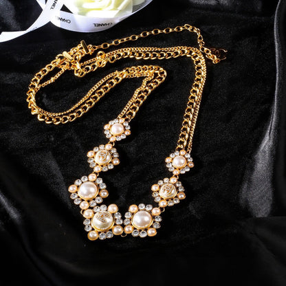 CHANEL 25S CHAIN BELT IN GOLD METALLIC WITH PEARL 614283
