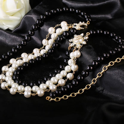 CHANEL 25S CHAIN BELT IN WHITE AND BLACK PEARL 614477