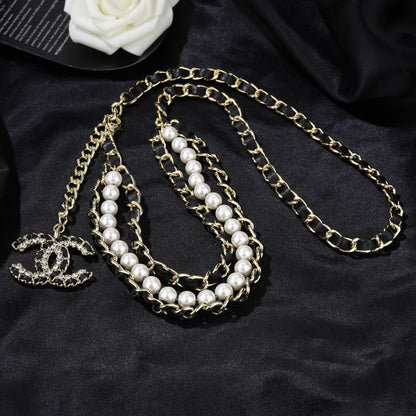 CHANEL 25S CHAIN BELT IN WHITE PEARL AND BLACK CALFSKIN 612711