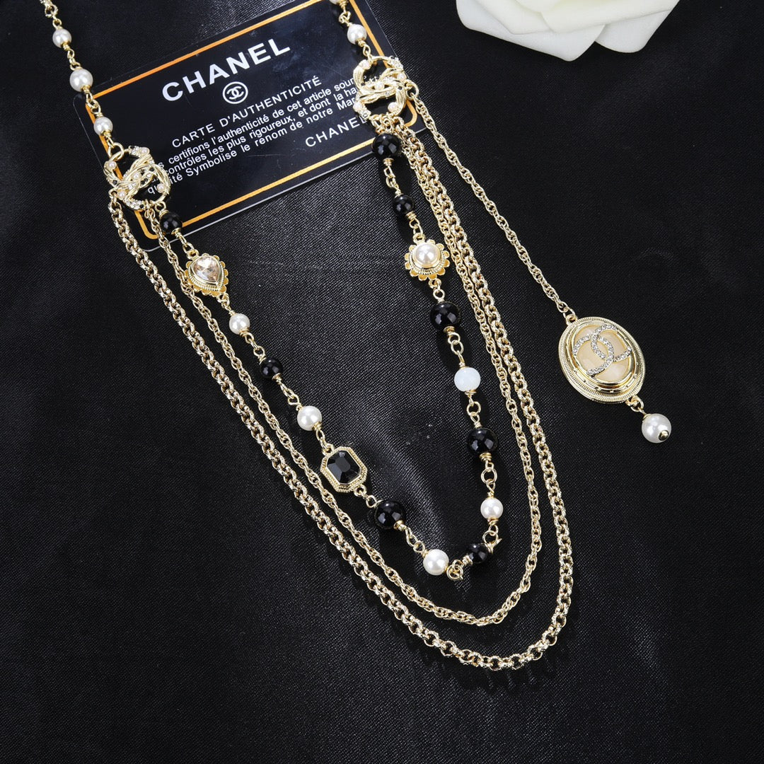 CHANEL 25S CHAIN BELT WITH PEARL 610546