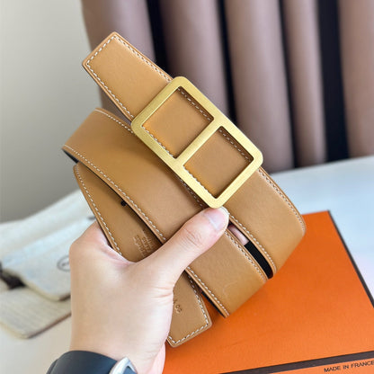 HERMES BELT BUCKLE & REVERSIBLE ORANGE PASTEL AND BLACK LEATHER STRAP 38MM GOLD HARDWARE