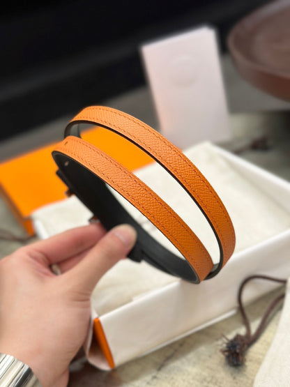 HERMES FOCUS BUCKLE & REVERSIBLE ORANGE AND BLACK LEATHER STRAP 13MM SILVER HARDWARE