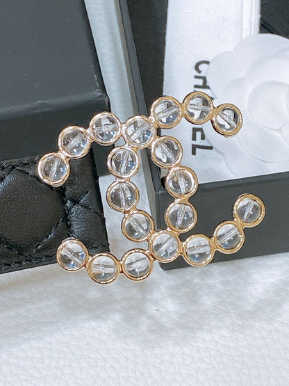 CHANEL BELT 30 MM IN BLACK EMBROIDERED CALFSKIN PEARL LOGO WITH GOLD HARDWARE