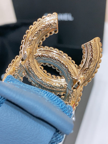 CHANEL DOUBLE C ELASTIC BELT 30MM IN BLUE DENIM WITH GOLD BUCKLE AND SIDE RHINESTONE DETAILING