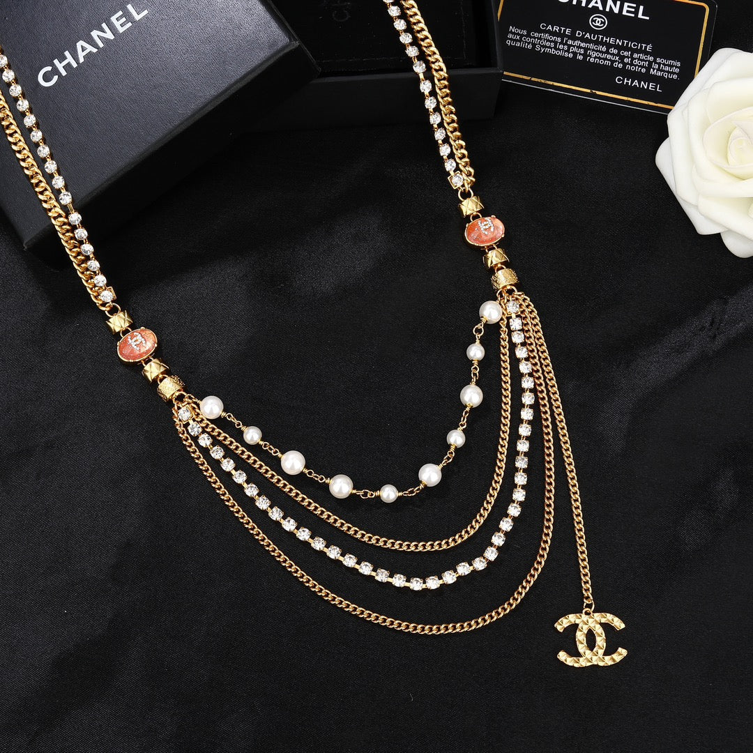 CHANEL 25S GOLD CHAIN BELT WITH PEARL 611794